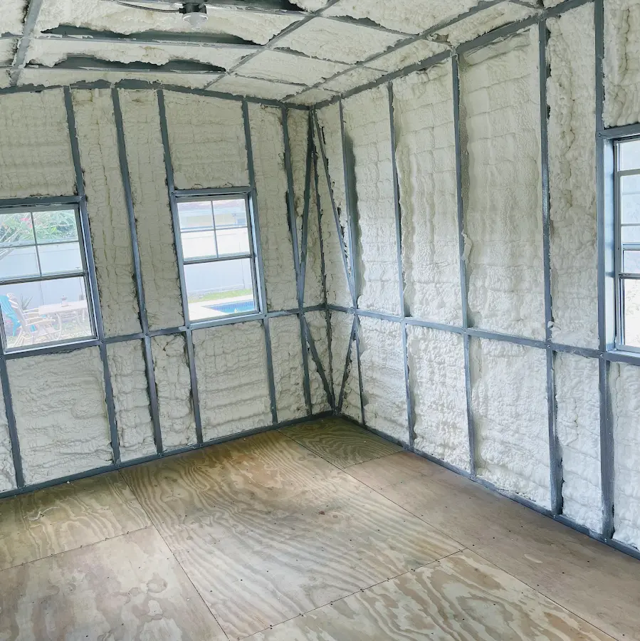 Closed-cell spray foam insulation applied to wall cavities in a residential project in Fremont